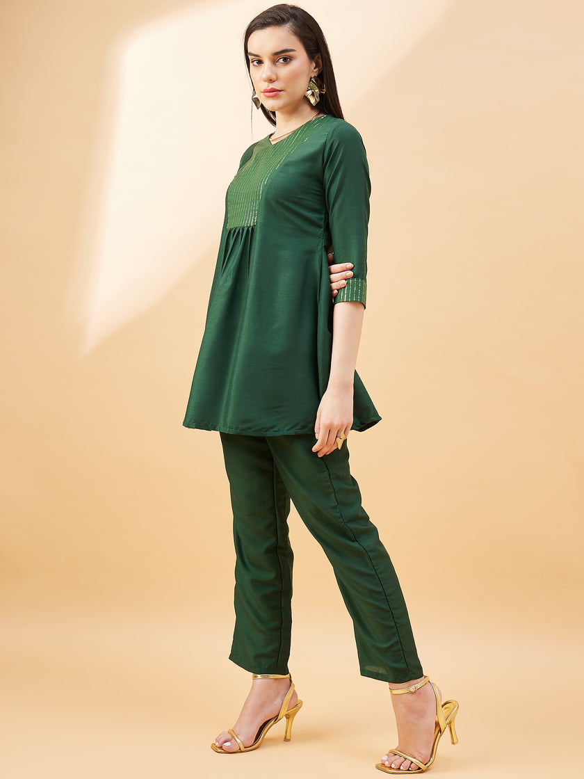 Green  Cotton Blend Solid A-Line Kurta  Trouser