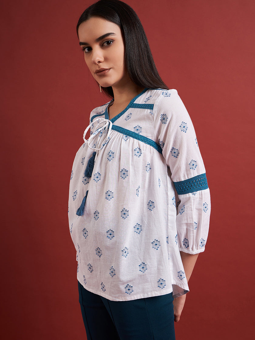 White Pure Cotton Embroidered Tie-Ups Puff Sleeves Indigo Tops