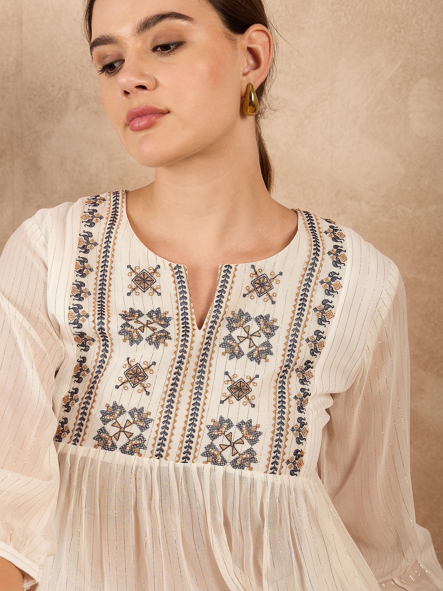 Off White Synthetic Georgette Embroidered Gathered or Pleated Regular Sleeves Ethnic Print Tops